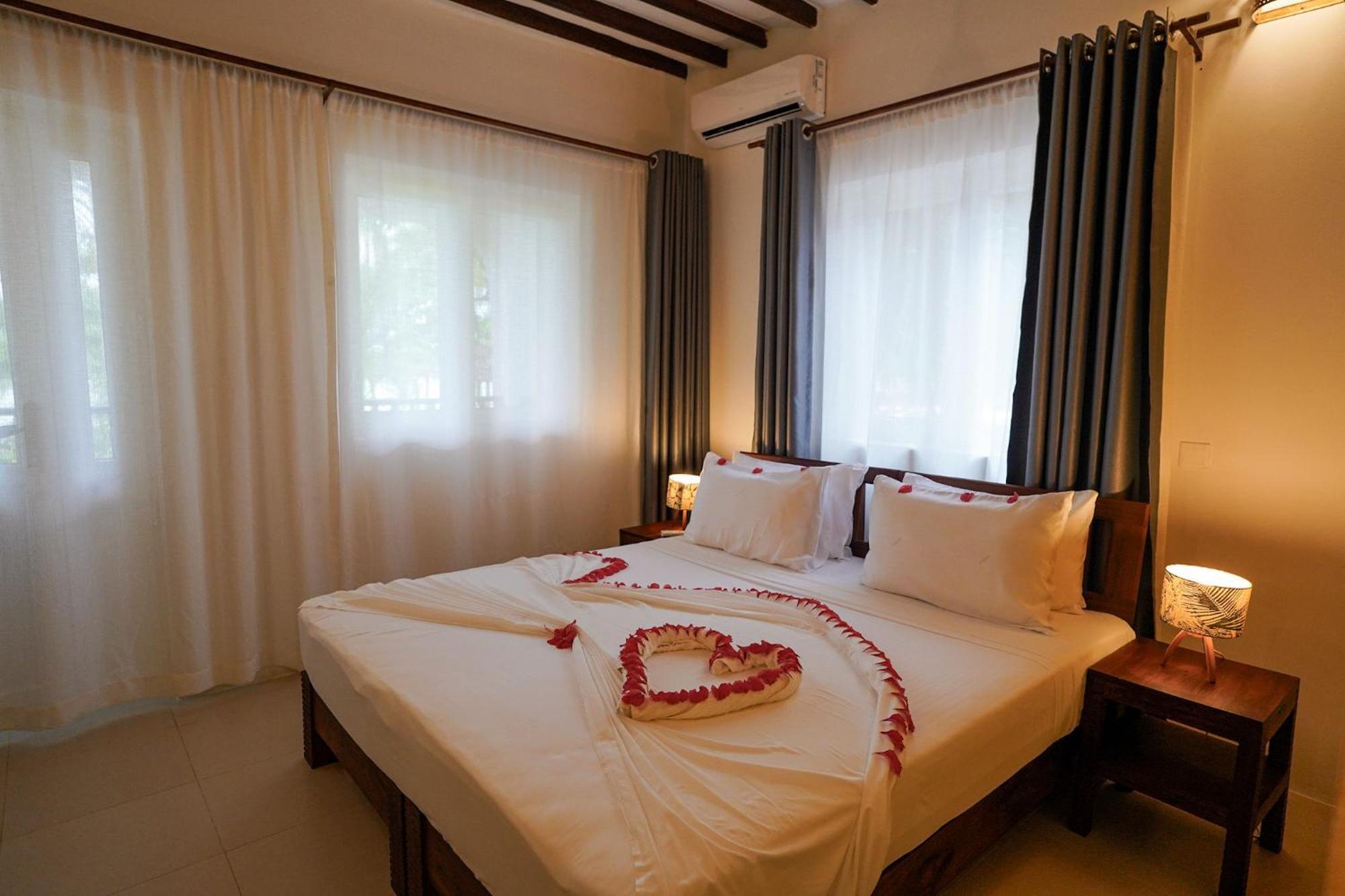 Manolo Beach Resort Uroa Pokoj fotografie