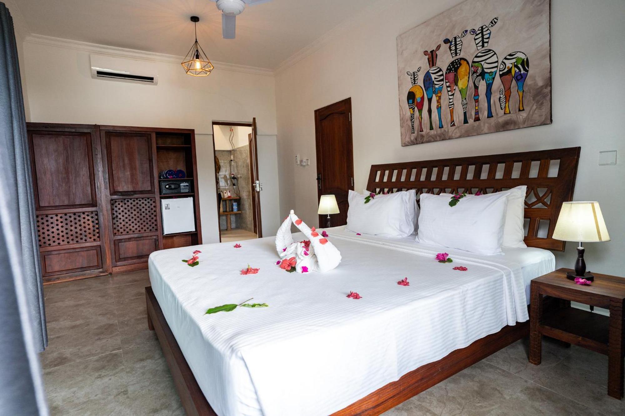 Manolo Beach Resort Uroa Pokoj fotografie
